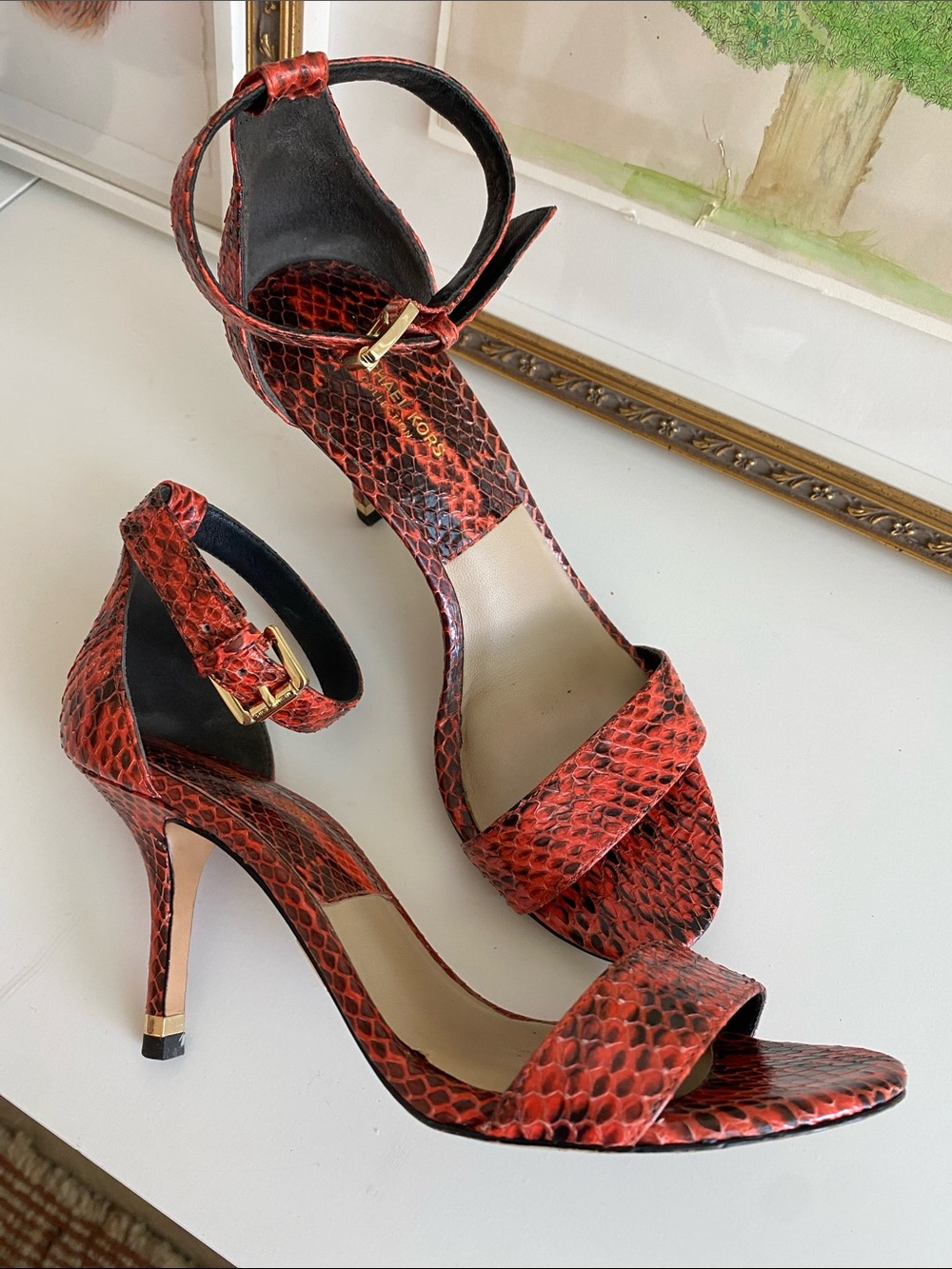 Red ‘snakeskin’ heel